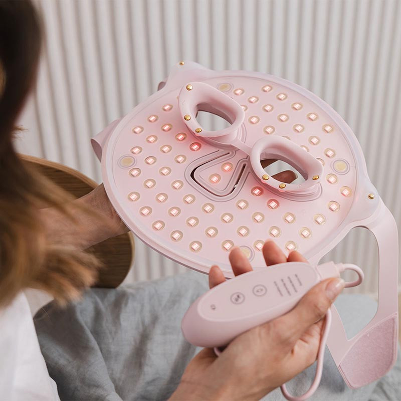 Фототерапевтична маска за лице Beautifly Aura Glam, 220 LED светлини, Колагенова регенерация и антиейдж ефект, 3 интензитета, Охлаждане, USB-C, Розов