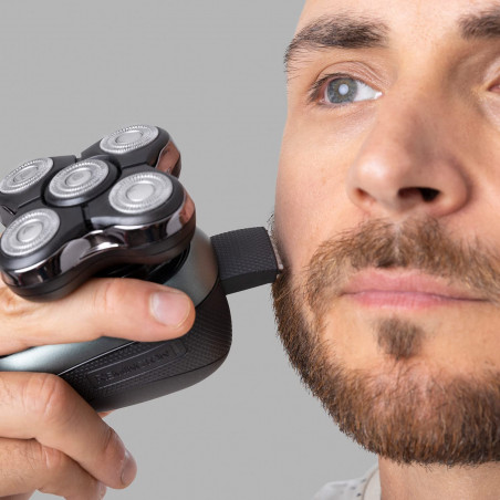 Самобръсначка за глава Remington RX7 XR1600 Ultimate Series, Автономия 60 мин, Водоустойчив, Подвижна глава, Турбо, Стоманени остриета, Индикатори, Черен/зелен