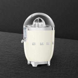 Електрическа цитрус преса Smeg CJF11CREU, 70 W, Антикапкова система, Противоплъзгаща се основа, Крема